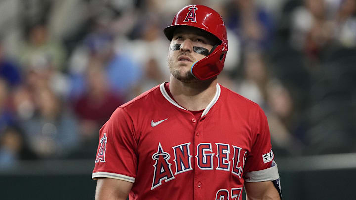 Los Angeles Angels right fielder Mike Trout looks on after striking out against the Texas Rangers. Los Angeles Angels right fielder Mike Trout looks on after striking out against the Texas Rangers.