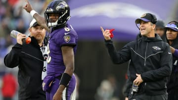 Lamar Jackson (L), John Harbaugh (R), Philadelphia Eagles