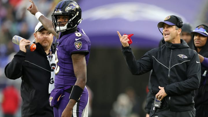 Lamar Jackson (L), John Harbaugh (R), Philadelphia Eagles