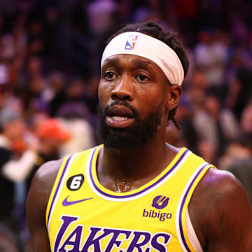 Dec 19, 2022; Phoenix, Arizona, USA; Los Angeles Lakers guard Patrick Beverley (21) against the Phoenix Suns at Footprint Center. Mandatory Credit: Mark J. Rebilas-Imagn Images