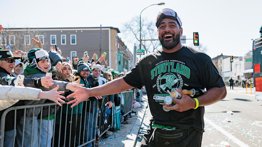 Philadelphia Eagles offensive tackle Jordan Mailata celebrates during the Super Bowl LIX championship parade and rally. | Caean Couto-Imagn Images