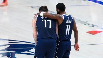 Dallas Mavericks guard Luka Doncic (77) and Dallas Mavericks guard Kyrie Irving.