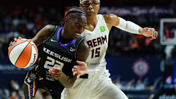 Connecticut Sun guard Saniya Rivers (22) drives the ball against Atlanta Dream guard Allisha Gray (15) in the second half at Mohegan Sun Arena. 