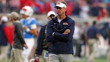 Nov 9, 2024; Oxford, Mississippi, USA; Mississippi Rebels head coach Lane Kiffin watches during warm ups prior to the game against the Georgia Bulldogs at Vaught-Hemingway Stadium. Mandatory Credit: Petre Thomas-Imagn Images