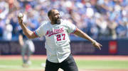 Montreal Expos former player Vladimir Guerrero Sr. throws out the ceremonial first pitch against the Tampa Bay Rays at Rogers Centre in 2022.