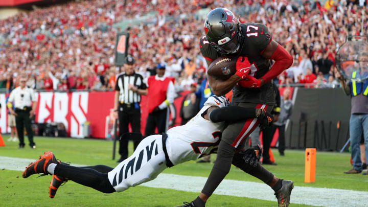 Dec 18, 2022; Tampa, Florida, USA;  Tampa Bay Buccaneers wide receiver Russell Gage (17) catches a passs for a touchdown guarded by Cincinnati Bengals cornerback Cam Taylor-Britt (29) in the second quarter at Raymond James Stadium. Mandatory Credit: Nathan Ray Seebeck-USA TODAY Sports