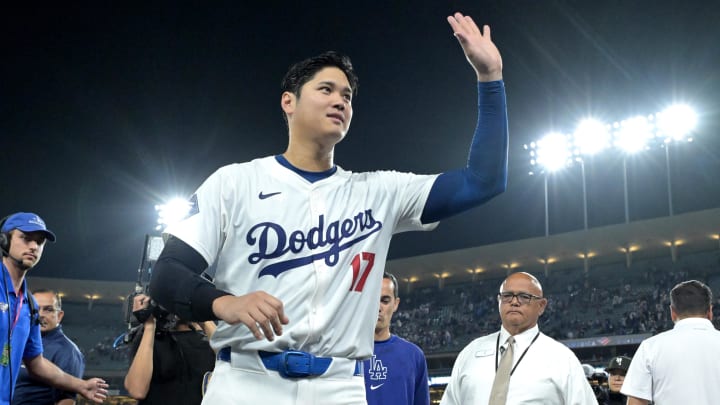 Aug 23, 2024; Los Angeles, California, USA;  Los Angeles Dodgers designated hitter Shohei Ohtani (17) smiles to fans as he leaves the field after hitting a walk-off grand slam home run, his 40th of the season, in the ninth inning against the Tampa Bay Rays at Dodger Stadium. Watson. Mandatory Credit: Jayne Kamin-Oncea-USA TODAY Sports