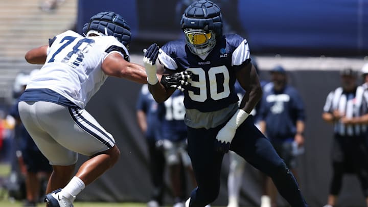 Jul 30, 2024; Oxnard, CA, USA; Dallas Cowboys defensive end DeMarcus Lawrence rushes against offensive tackle Terence Steele during training camp at the River Ridge Playing Fields in Oxnard, California.