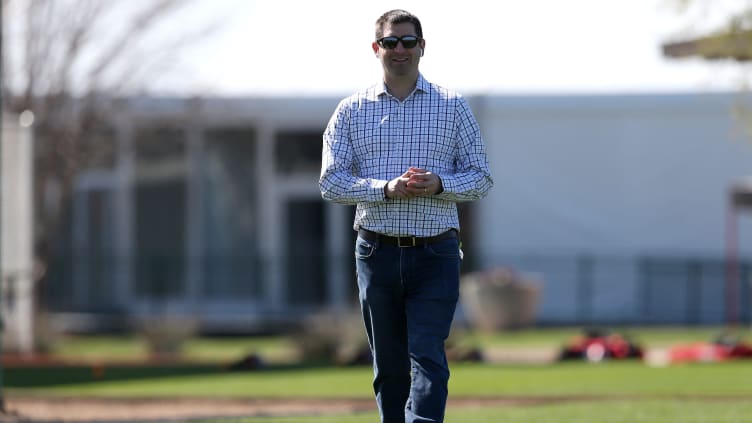 Cincinnati Reds general manager Nick Krall takes a phone call.