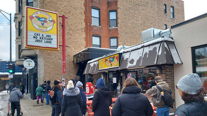 Bears fans braved bitter cold for free hot dogs Tuesday afternoon.