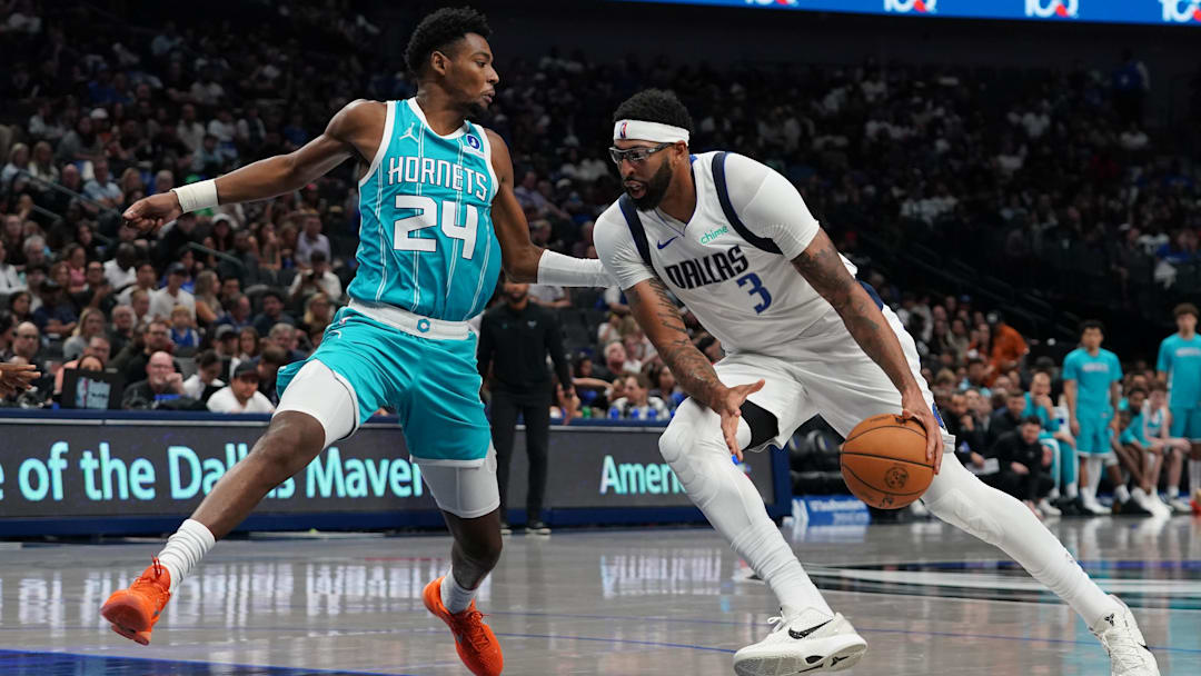 Oct 11, 2025; Dallas, Texas, USA; Dallas Mavericks forward/center Anthony Davis (3) works on Charlotte Hornets forward Brandon Miller (24) in the second half of a game at American Airlines Center. Mandatory Credit: Raymond Carlin III-Imagn Images