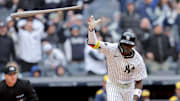 New York Yankees second baseman Chisholm Jr. flips his bat after hitting a three run home run against the Milwaukee Brewers during the seventh inning at Yankee Stadium. 