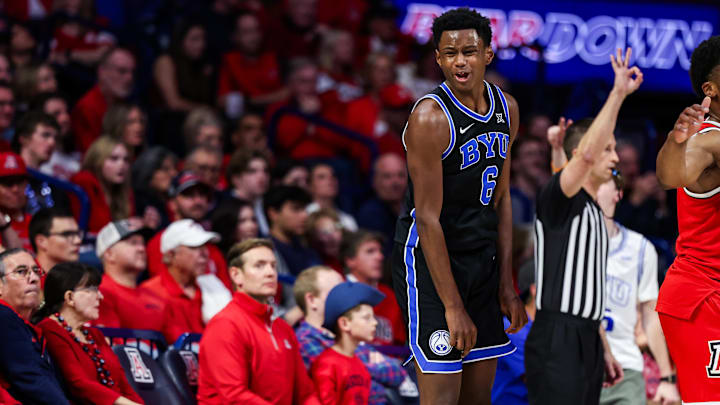 Feb 22, 2025; Tucson, Arizona, USA; BYU Cougars forward Kanon Catchings (6) celebrates after making a three-point basket during the second half against the Arizona Wildcats at McKale Center. Mandatory Credit: Aryanna Frank-Imagn Images