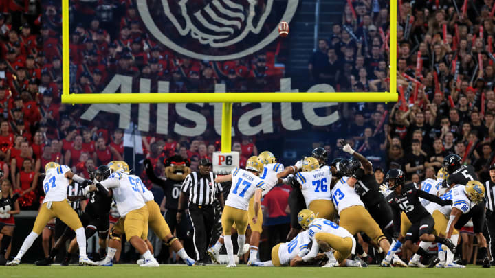 Aug 29, 2019; Cincinnati, OH, USA; UCLA Bruins place kicker JJ Molson (17) kicks an extra point against the Cincinnati Bearcats in the first half at Nippert Stadium. Mandatory Credit: Aaron Doster-USA TODAY Sports