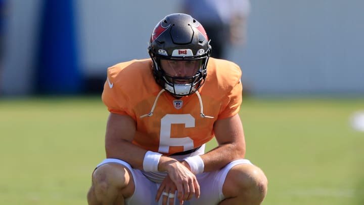 Tampa Bay Buccaneers quarterback Baker Mayfield (6) rests during a combined NFL football training camp session between the Tampa Bay Buccaneers and Jacksonville Jaguars Wednesday, Aug. 14, 2024 at EverBank Stadium’s Miller Electric Center in Jacksonville, Fla. [Corey Perrine/Florida Times-Union]