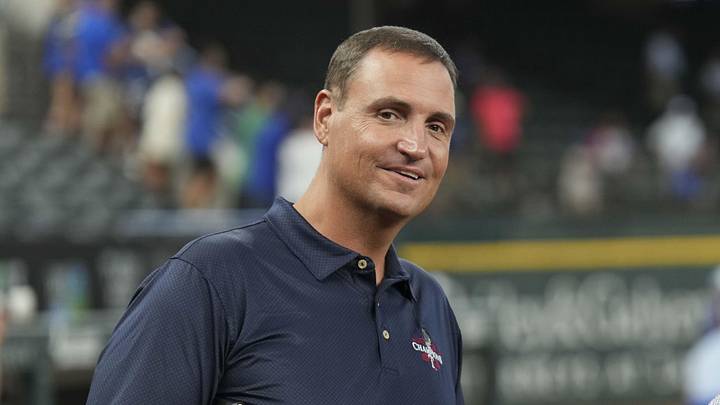 Jun 21, 2024; Arlington, Texas, USA; Texas Rangers general manager Chris Young (left) and Kansas City Royals general manager J.J. Picollo (right) talk before the game against the Kansas City Royals at Globe Life Field. Mandatory Credit: Jim Cowsert-Imagn Images
