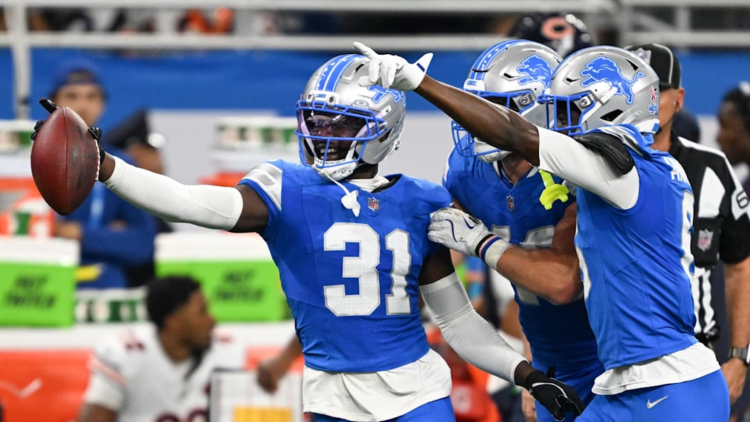 Sep 14, 2025; Detroit, Michigan, USA; Detroit Lions safety Kerby Joseph (31) celebrates with teammates after inception against the Chicago Bears during the second quarter of the game at Ford Field. Mandatory Credit: Lon Horwedel-Imagn Images