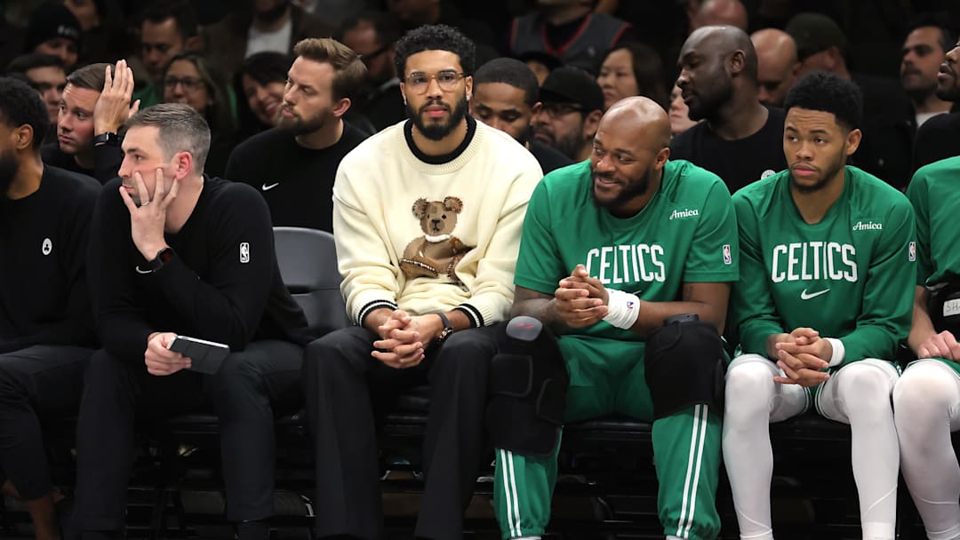 Nov 18, 2025; Brooklyn, New York, USA; Boston Celtics injured forward Jayson Tatum (0) watches from the bench during the third quarter against the Brooklyn Nets at Barclays Center. Mandatory Credit: Brad Penner-Imagn Images
