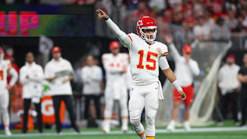 Sep 22, 2024; Atlanta, Georgia, USA; Kansas City Chiefs quarterback Patrick Mahomes (15) looks for a first down against the Atlanta Falcons in the first quarter at Mercedes-Benz Stadium. Mandatory Credit: Brett Davis-Imagn Images