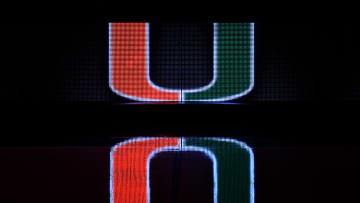 Dec 8, 2020; Coral Gables, Florida, USA; A general view of a reflection of the Miami Hurricanes school logo on the scorers table prior to the game between the Miami Hurricanes and the Purdue Boilermakers at Watsco Center. Mandatory Credit: Jasen Vinlove-USA TODAY Sports