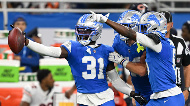 Sep 14, 2025; Detroit, Michigan, USA; Detroit Lions safety Kerby Joseph (31) celebrates with teammates after inception against the Chicago Bears during the second quarter of the game at Ford Field. Mandatory Credit: Lon Horwedel-Imagn Images