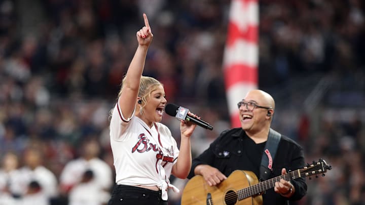 Oct 31, 2021; Atlanta, Georgia, USA; Recording artist Lauren Alaina sings the National Anthem prior to game five of the 2021 World Series between the Atlanta Braves and the Houston Astros at Truist Park.