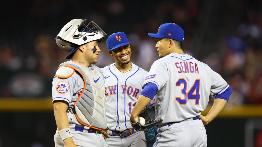 Jul 5, 2023; Phoenix, Arizona, USA; New York Mets pitcher Kodai Senga (34) with catcher Francisco Alvarez (4) and shortstop Francisco Lindor (12) against the Arizona Diamondbacks at Chase Field. Mandatory Credit: Mark J. Rebilas-Imagn Images