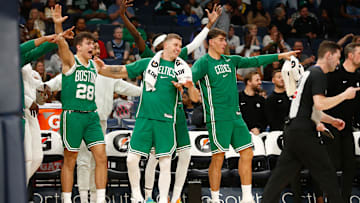 Oct 8, 2025; Memphis, Tennessee, USA; Boston Celtics guard Hugo Gonzalez (28), forward Baylor Scheierman (55) and center Luka Garza (52) react during the second quarter against the Memphis Grizzlies at FedExForum. Mandatory Credit: Petre Thomas-Imagn Images