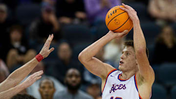 Evansville   s Ben Humrichous (13) takes a shot as the University of Evansville Purple Aces play the Miami (Ohio) University Redhawks at Ford Center in Evansville, Ind., Monday, Nov. 6, 2023.