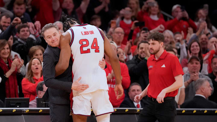Mar 14, 2026; New York, NY, USA; St. John's basketball head coach Rick Pitino hugs forward Zuby Ejiofor (24) on the bench in the closing moments of second half of the men's Big East Conference Tournament Championship against the Connecticut Huskies at Madison Square Garden.