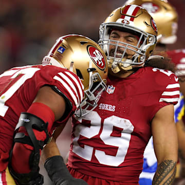 Dec 12, 2024; Santa Clara, California, USA; San Francisco 49ers linebacker Dre Greenlaw (57) is congratulated by safety Talanoa Hufanga (29) after making a tackle against the Los Angeles Rams in the first quarter at Levi's Stadium. 