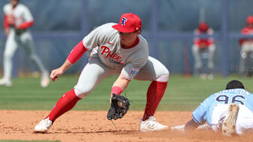 Feb 25, 2025; Port Charlotte, Florida, USA;  Tampa Bay Rays outfielder Chandler Simpson (96) slides safely into second base against Philadelphia Phillies infielder Aidan Miller (81) at Charlotte Sports Park. 