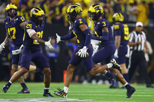 Michigan Wolverines cornerback Will Johnson celebrates an interception in the 2023 national championship game