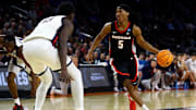 Mar 20, 2025; Wichita, KS, USA; Georgia Bulldogs guard Silas Demary Jr. (5) dribbles against Gonzaga Bulldogs forward Graham Ike (13) in the second half of a first round men’s NCAA Tournament game at Intrust Bank Arena. Mandatory Credit: Nick Tre. Smith-Imagn Images
