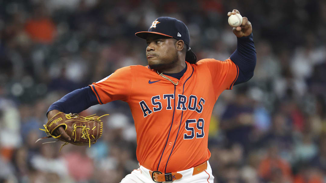 May 30, 2025; Houston, Texas, USA; Houston Astros starting pitcher Framber Valdez (59) delivers a pitch during the first inning against the Tampa Bay Rays at Daikin Park.