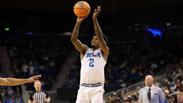 Nov 7, 2025; Los Angeles, California, USA;  UCLA Bruins guard Donovan Dent (2) shoots the ball during the second half against the Pepperdine Waves at Pauley Pavilion presented by Wescom Financial. Mandatory Credit: Kiyoshi Mio-Imagn Images