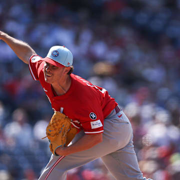 Jul 4, 2025; Philadelphia, Pennsylvania, USA; Cincinnati Reds pitcher Emilio Pagan (15) throws a pitch during the ninth inning against the Philadelphia Phillies at Citizens Bank Park. Mandatory Credit: Bill Streicher-Imagn Images