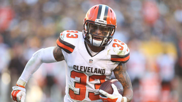 Nov 15, 2015; Pittsburgh, PA, USA; Cleveland Browns free safety Jordan Poyer (33) returns an interception against the Pittsburgh Steelers during the fourth quarter at Heinz Field. The Steelers won 30-9. Mandatory Credit: Charles LeClaire-Imagn Images