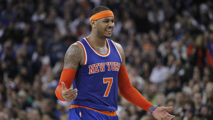 Dec 27, 2014; Sacramento, CA, USA; New York Knicks forward Carmelo Anthony (7) reacts after being called for a foul against the Sacramento Kings in the third quarter at Sleep Train Arena. The Kings won 135-129 in overtime. Mandatory Credit: Cary Edmondson-USA TODAY Sports