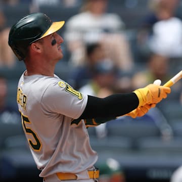 Jun 28, 2025; Bronx, New York, USA;  Athletics designated hitter Brent Rooker (25) looks up at his solo home run during the fourth inning against the New York Yankees at Yankee Stadium. Mandatory Credit: Vincent Carchietta-Imagn Images