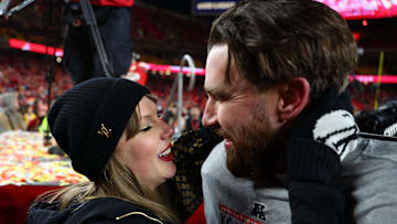 Jan. 26, 2025; Kansas City, MO, USA; Recording artist Taylor Swift  and Kansas City Chiefs tight end Travis Kelce (87) react after the AFC Championship game against the Buffalo Bills at GEHA Field at Arrowhead Stadium.