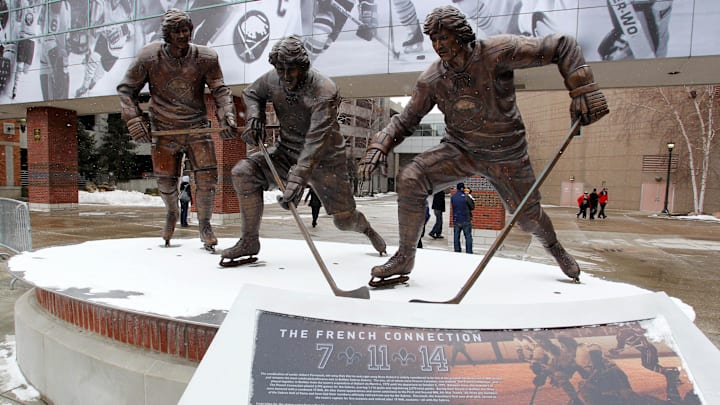 Feb. 17, 2013; Buffalo, NY, USA;  A general view of a sculpture featuring former Buffalo Sabres players from the French Connection Rick Martin, Gilbert Perreault and Rene Robert outside of the First Niagara Center before a game between the Buffalo Sabres and the Pittsburgh Penguins .  Mandatory Credit: Timothy T. Ludwig-Imagn Images