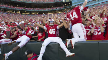 Sep 3, 2016; Green Bay, WI, USA;  Wisconsin Badgers players celebrate defeating the LSU Tigers by