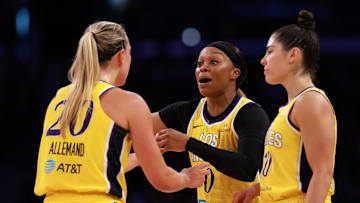 Jun 1, 2025; Los Angeles, California, USA;  Los Angeles Sparks guard Odyssey Sims (0, center) speaks to guard Julie Allemand (20) and guard Kelsey Plum (10) during the first half against the Phoenix Mercury at Crypto.com Arena. Mandatory Credit: Kiyoshi Mio-Imagn Images