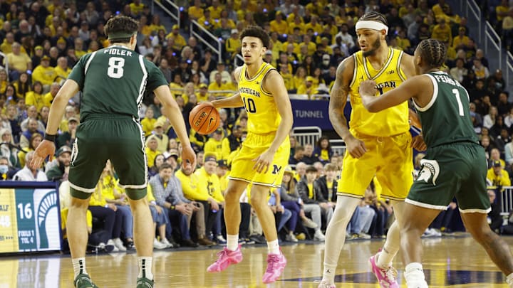 Feb 21, 2025; Ann Arbor, Michigan, USA; Michigan Wolverines guard Justin Pippen (10) handles the ball during the first half against the Michigan State Spartans at Crisler Center. Mandatory Credit: Brian Bradshaw Sevald-Imagn Images