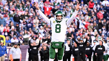 Oct 27, 2024; Foxborough, Massachusetts, USA; New York Jets quarterback Aaron Rodgers reacts after throwing for a touchdown.