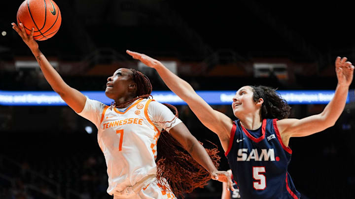 Tennessee guard Samara Spencer (7) attempts a shot past Samford guard Sadie Stetson (5) during a basketball game between the Lady Vols and Samford held at Thompson-Boling Arena at Food City Center in Knoxville on Tuesday, Nov. 5, 2024.