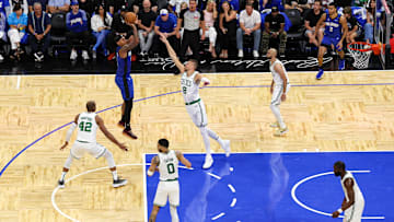 Orlando Magic forward Paolo Banchero (5) shoots the ball against the Boston Celtics in the third quarter during game four of first round for the 2025 NBA Playoffs at Kia Center.
