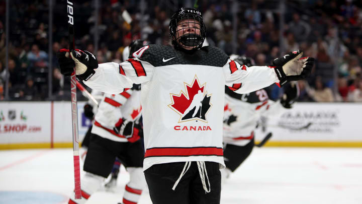Dec 19, 2022; Los Angeles, California, USA; Team Canada forward Sarah Fillier (10) celebrates a goal against Team United States during the second period of a Rivalry Series ice hockey game at Crypto.com Arena. Mandatory Credit: Kiyoshi Mio-USA TODAY Sports