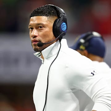 Jan 20, 2025; Atlanta, GA, USA; Notre Dame Fighting Irish head coach Marcus Freeman looks on against the Ohio State Buckeyes during the first half the CFP National Championship college football game at Mercedes-Benz Stadium. 